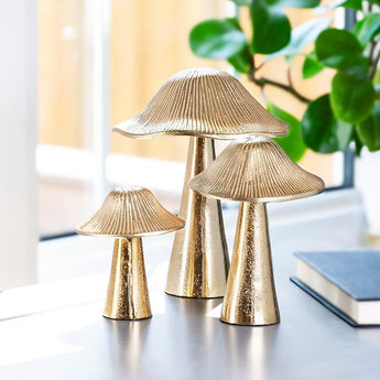 Set of 3 Ribbed Mushrooms on an office desk.