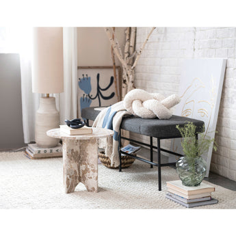 Marble Table with Interlocking Base in an apartment styled with books and wooden links. 