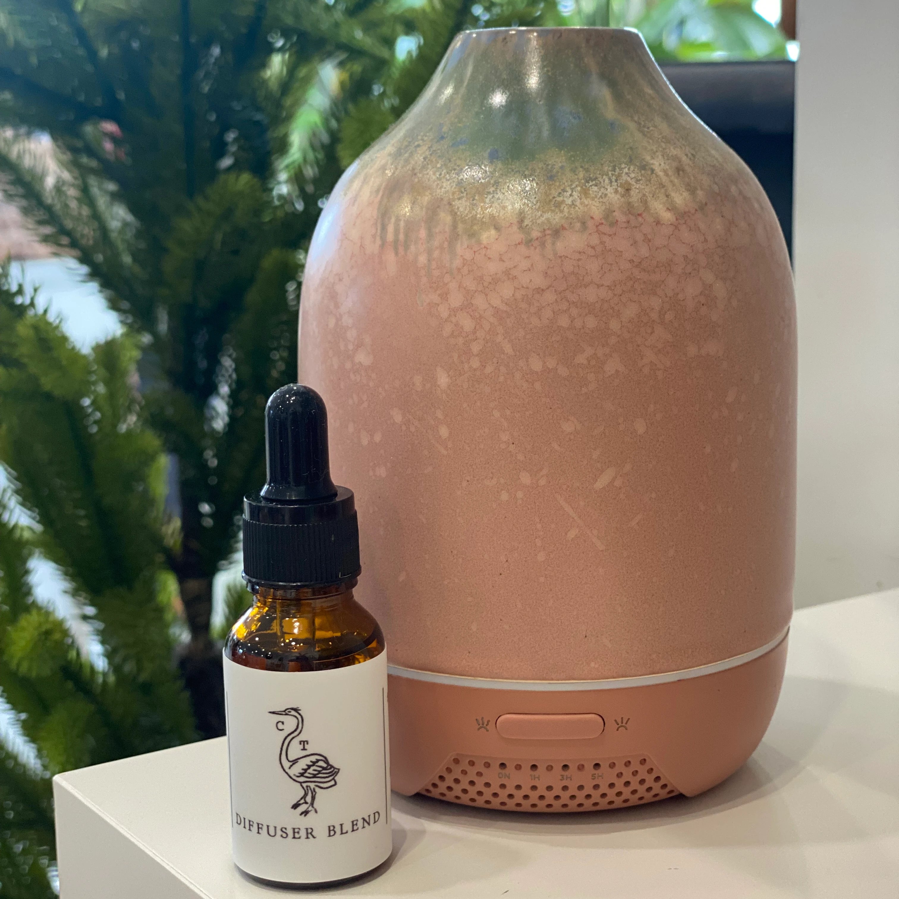 Good vibes essential oil blend with a 5 ounce stoneware diffuser. 