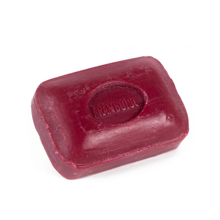 Coconut oil and raspberry infused soap bar made in France. 