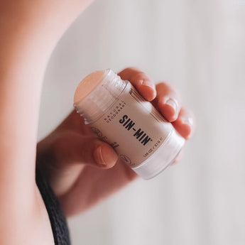 Natural Deodorant - Aluminum-Free (Sweet Cinnamon + Vanilla) being applied to the underarm. 