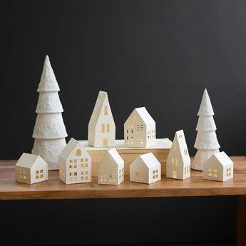 Charming set of eight houses for a white holiday village. 