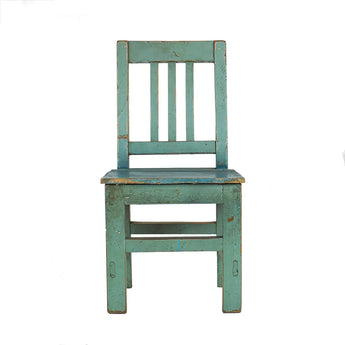 Child's chair painted vintage green and distressed. 