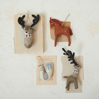 Assortment handmade felt animal ornaments.