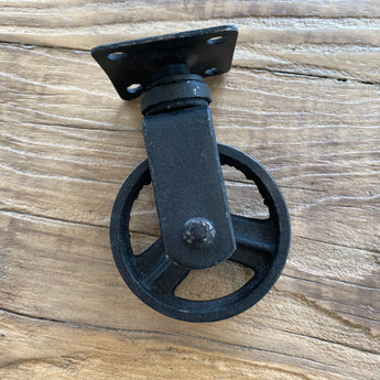 Black iron caster wheel for furniture.