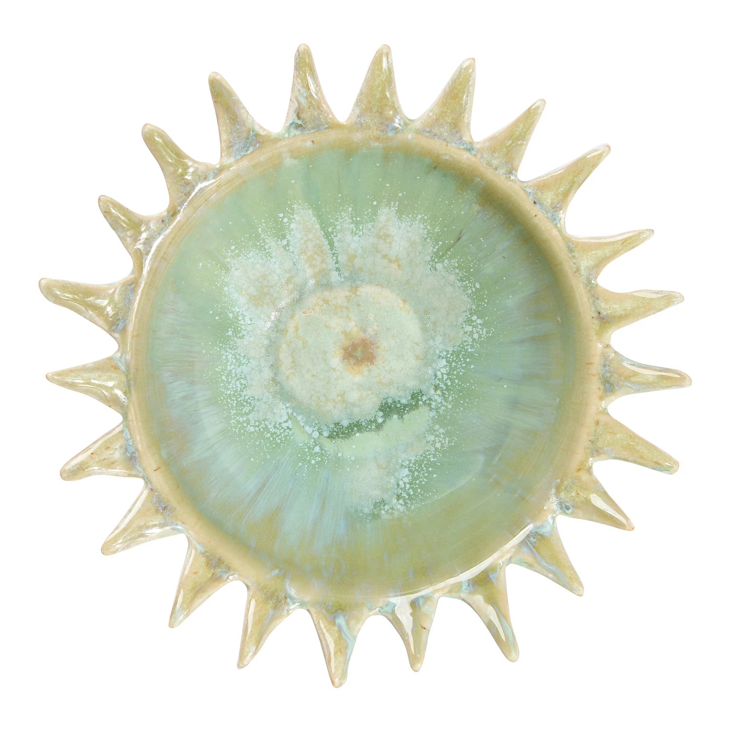 Stoneware sunburst shaped serving bowl with reactive glaze. 