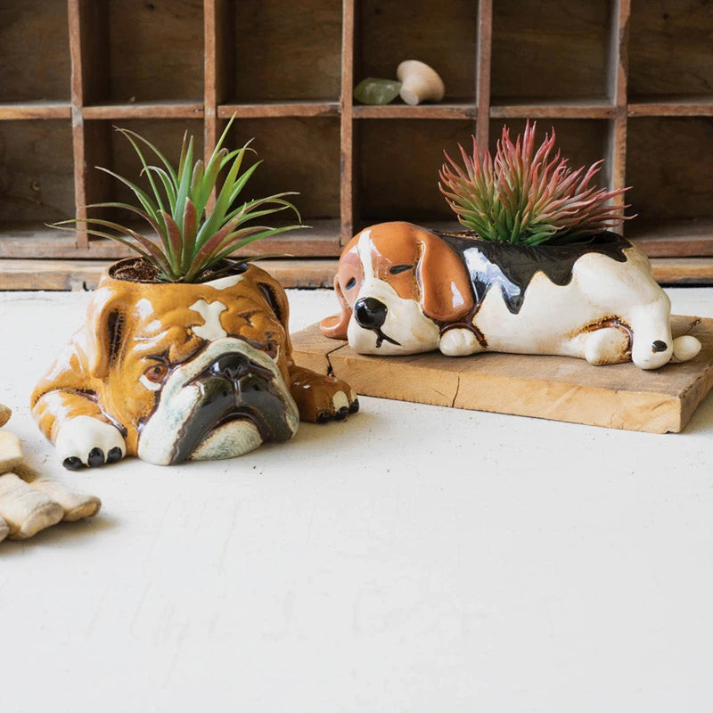 Two styles of dog themed planters