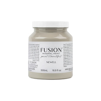 Fusion Mineral Paint pint jar in Newell, a soft and earthy mid-tone sage green shade with grey undertones, 500mL.