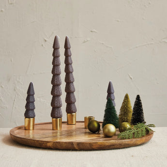 Decorative Mango Wood and Aluminum Tray Taper Holder holding beautifully textured tree shaped taper candles. 