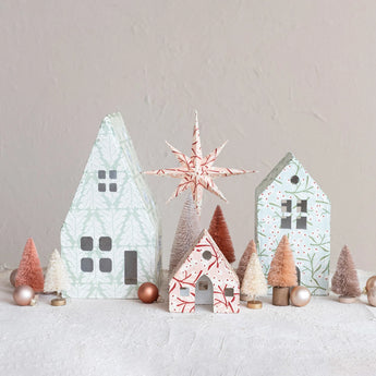 Three Printed Paper Mache Houses with Berry & Tree Patterns styled with sisal bottle trees, ornaments and a star tree topper. 