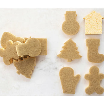 Six different holiday icon shaped two-sided sponges made of sisal and cellulose.