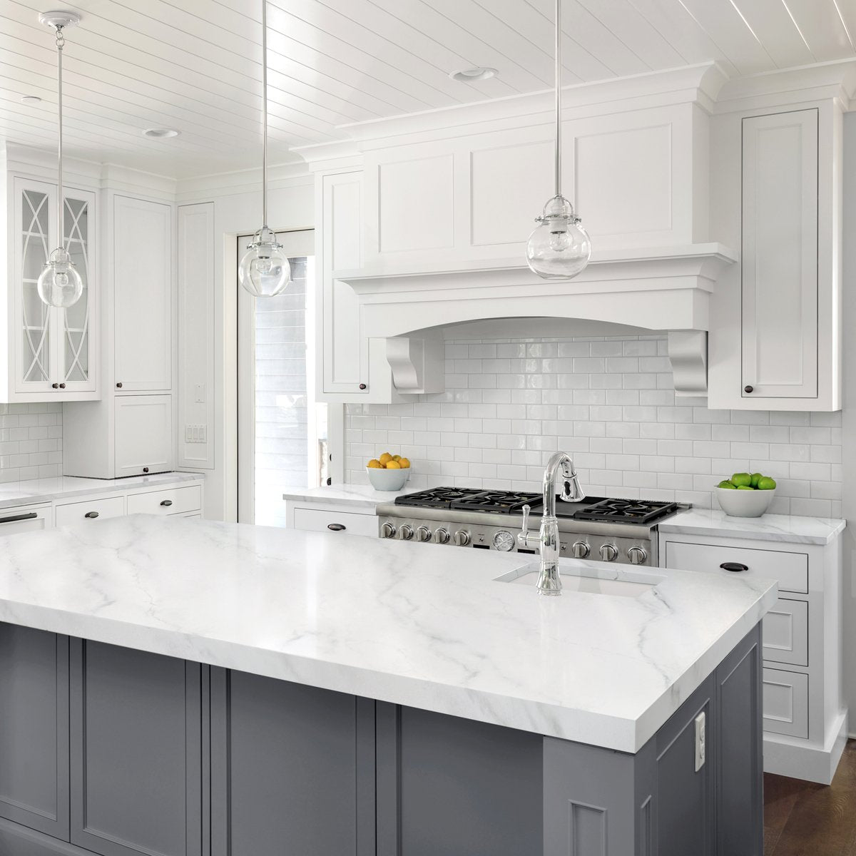 All white kitchen featuring the white Carrara marble countertops. 